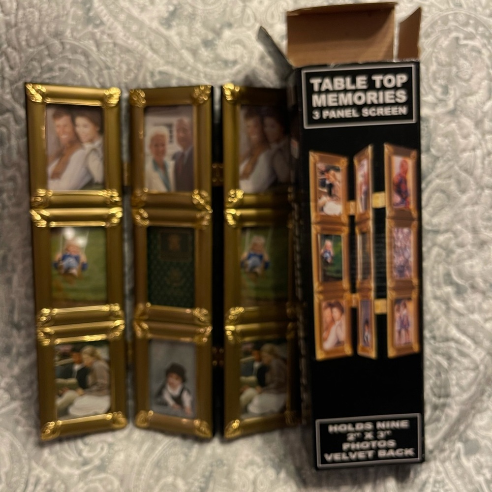 3 panel gold photo screen frame. Holds 9 2x3 photos